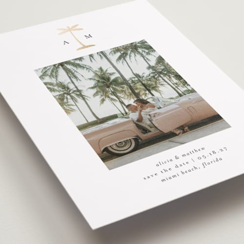 This is a coconut foil stamped save the date cards with foil pressed by Heather Schertzer called palm tree printing on recycled smooth signature in grand