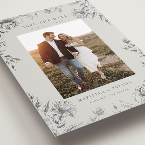 This is a steel foil stamped save the date cards with foil pressed by Chris Griffith called wildflower date printing on recycled smooth signature in grand