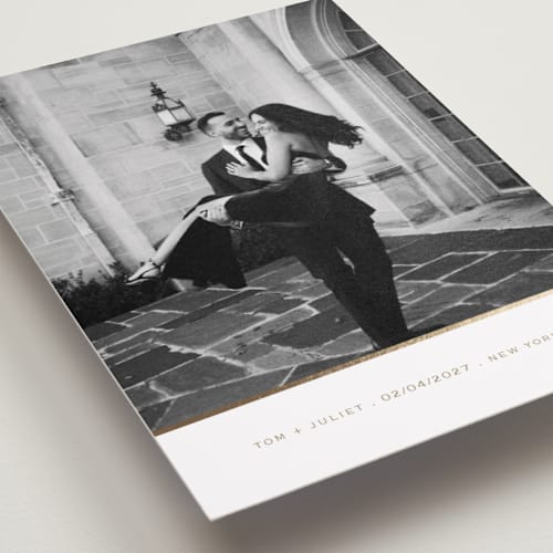 This is a golden foil stamped save the date cards with foil pressed by Ani Somi called joie printing on recycled smooth signature in grand