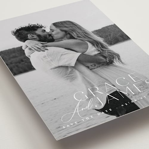 This is a snow save the date with standard by Angela Thompson called namesake printing on recycled smooth signature in grand