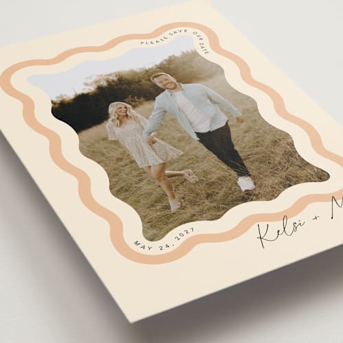 This is a seashell save the date with standard by Robert and Stella called wavy printing on recycled smooth signature in grand
