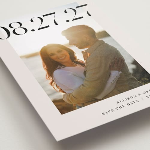 This is a ivory save the date with standard by Pixel and Hank called all stacked up printing on recycled smooth signature in grand