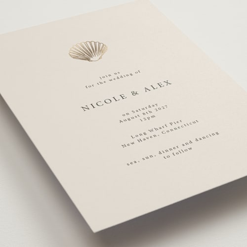 This is a sand wedding invitations with foil pressed by Hannah Bowman called simple seashell printing on signature in grand