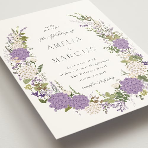 This is a lilac wedding invitations with foil pressed by Susan Moyal called garden whisper printing on signature in grand
