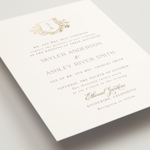 This is a champagne wedding invitations with foil pressed by Cass Loh called floral crest printing on signature in grand