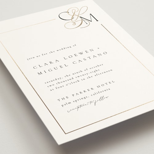This is a silk wedding invitations with foil pressed by Kelly Schmidt called golden ampersand printing on signature in grand