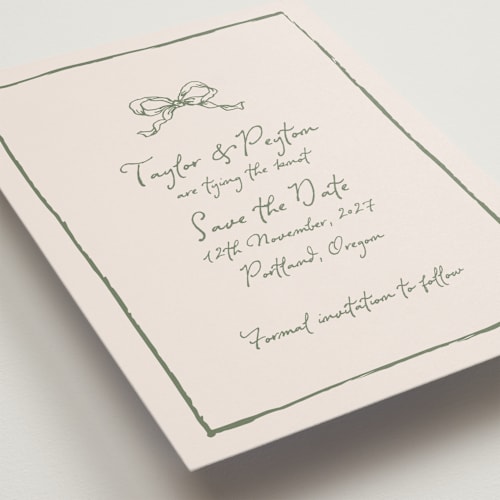 This is a moss save the date with standard by Cass Loh called ribbon bow drawing printing on signature in grand