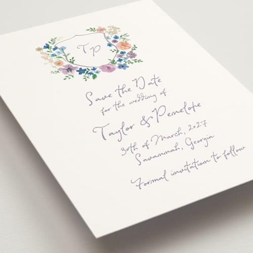 This is a lavender save the date with standard by Cass Loh called wildflowers crest printing on signature in grand