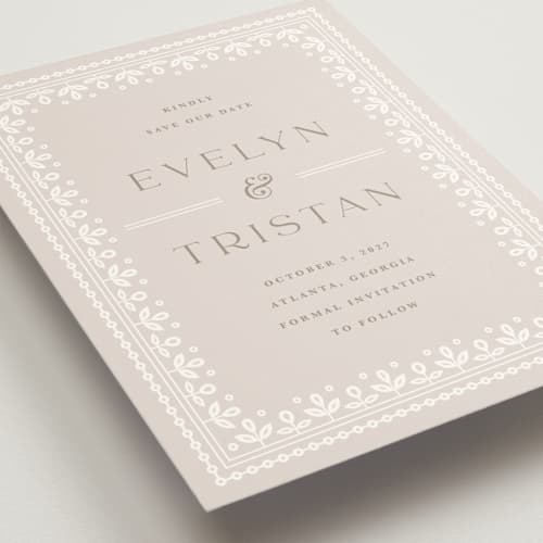 This is a cream save the date with standard by Kristen Smith called lace trim printing on signature in grand