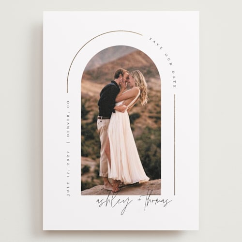 This is a silk foil stamped save the date cards with foil pressed by Kelly Schmidt called arch printing on recycled smooth signature in grand