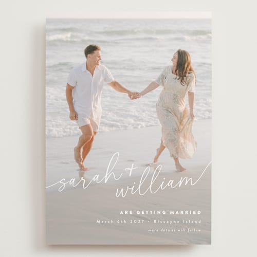 This is a ivory save the date with standard by Jessie Steury called sweet script printing on recycled smooth signature in grand