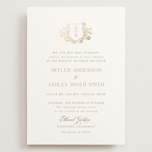 This is a champagne wedding invitations with foil pressed by Cass Loh called floral crest printing on signature in grand