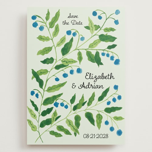This is a mint save the date with standard by Studio Suku called lily of the valley printing on signature in grand