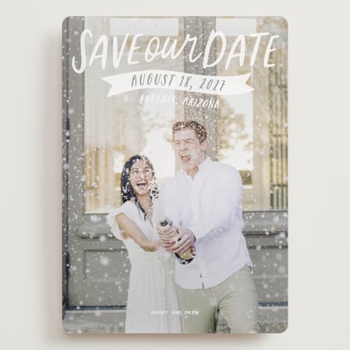 This is a silk save the date with standard by Jessie Steury called hand lettered printing on recycled smooth signature in grand