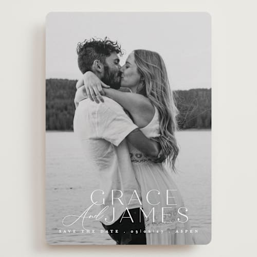 This is a snow save the date with standard by Angela Thompson called namesake printing on recycled smooth signature in grand