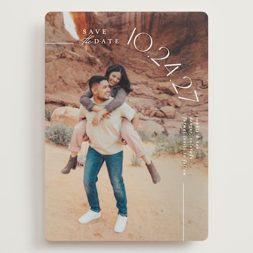 This is a pearl save the date with standard by Brooke Chandler called curved date printing on recycled smooth signature in grand