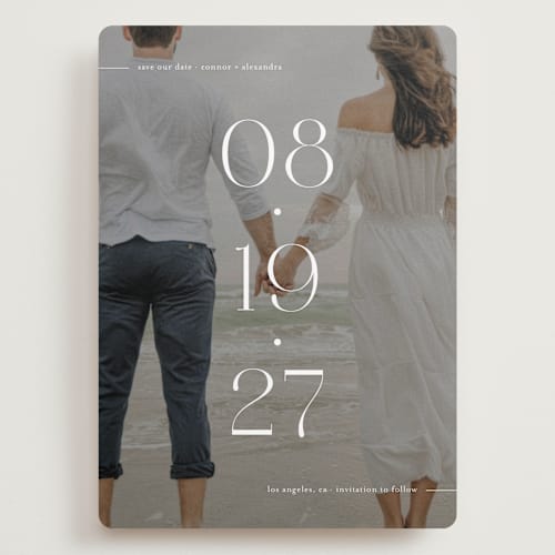 This is a pearl save the date with standard by Olivia Goree called horizon line printing on recycled smooth signature in grand