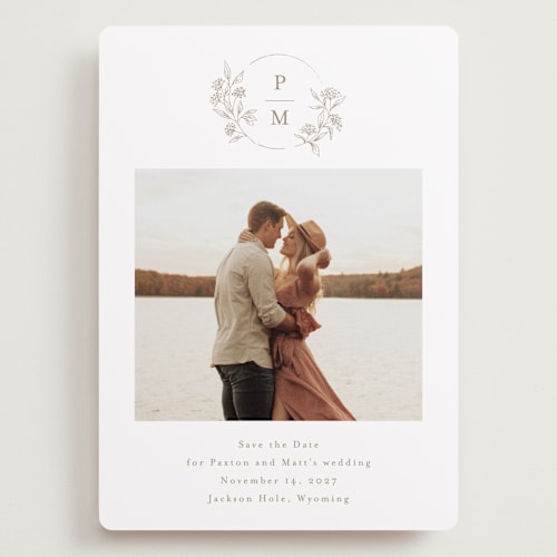 This is a taupe save the date with standard by Chris Griffith called monogrammed printing on recycled smooth signature in grand