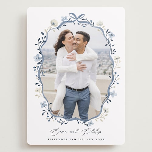 This is a french blue save the date with standard by Sarah Knight called parisian ribbon printing on recycled smooth signature in grand