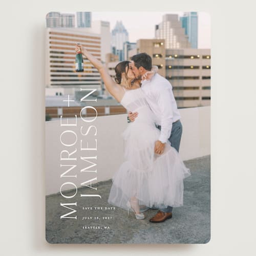 This is a quartz save the date with standard by Angela Garrick called carefree printing on recycled smooth signature in grand