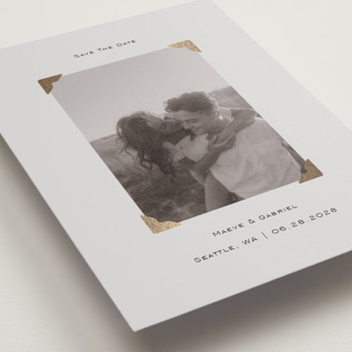 This is a cream petite save the dates with foil pressed by Jenny Millington called scrapbook frame printing on recycled smooth signature in petite