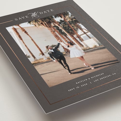 This is a graphite petite save the dates with foil pressed by Melanie Kosuge called mulholland printing on recycled smooth signature in petite