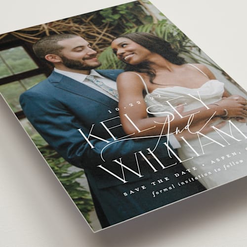 This is a pearl petite save the dates with standard by Brooke Chandler called l'amour printing on recycled smooth signature in petite