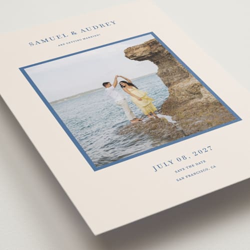 This is a beach blue petite save the dates with standard by Ani Somi called bermuda printing on recycled smooth signature in petite
