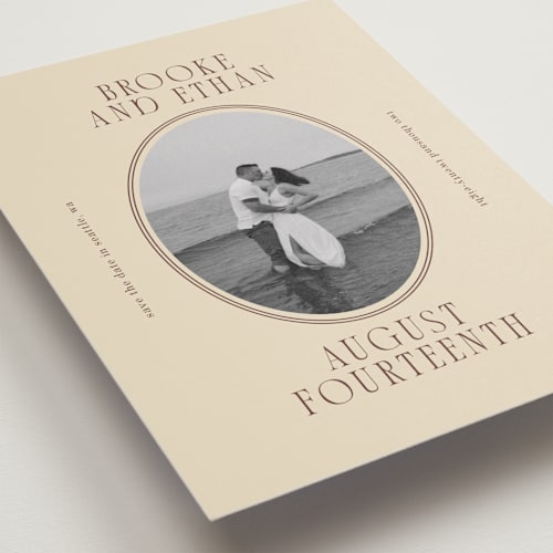 This is a buttercream petite save the dates with standard by Angela Garrick called ethan printing on recycled smooth signature in petite