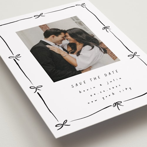 This is a coal petite save the dates with standard by Susan Zinader called preppy bow border printing on recycled smooth signature in petite