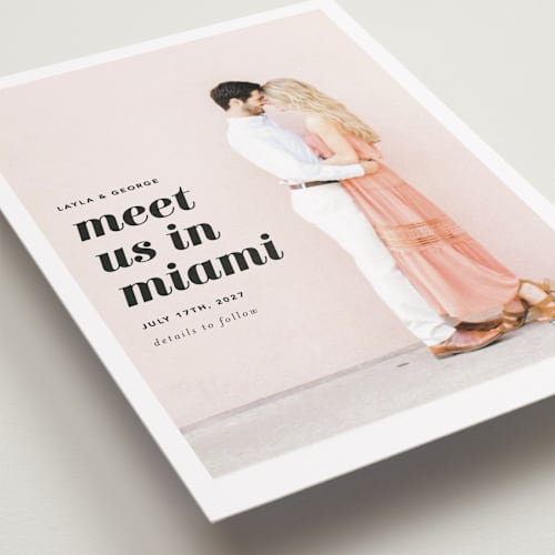 This is a blush petite save the dates with standard by Laura Hamm called meet us in miami printing on recycled smooth signature in petite