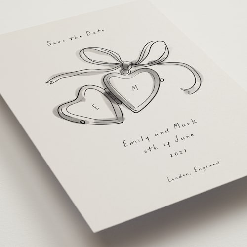 This is a ink wash petite save the dates with standard by Ani Somi called heart shaped locket printing on signature in petite