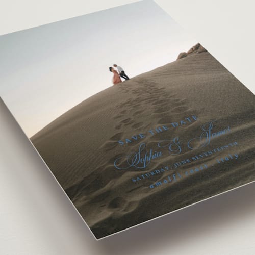 This is a blue mist save the date postcards with standard by Design Lotus called amalfi blue printing on signature in postcard