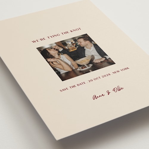 This is a burgundy save the date postcards with standard by Ani Somi called center cut printing on signature in postcard