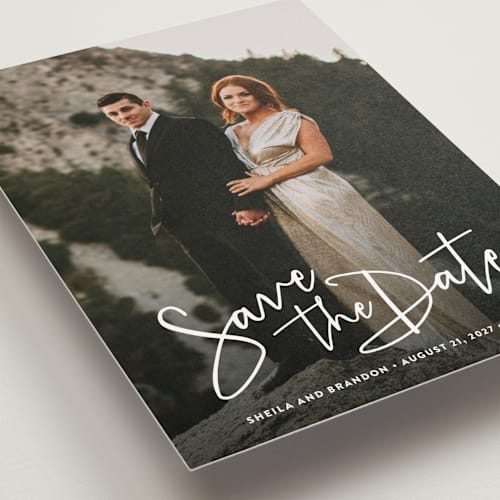 This is a cloud save the date postcards with standard by Hooray Creative called stylish script printing on signature in postcard