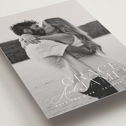 This is a snow save the date postcards with standard by Angela Thompson called namesake printing on signature in postcard