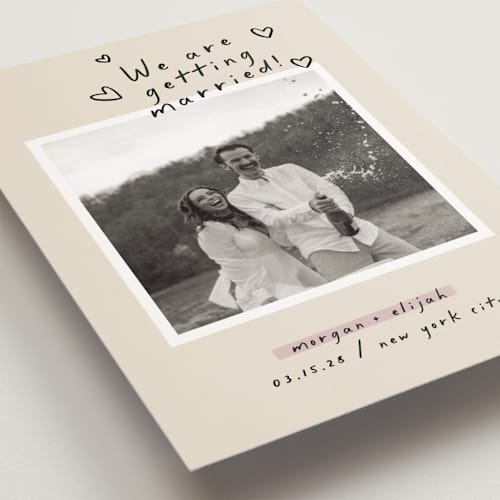 This is a nero save the date postcards with standard by Pati Cascino called surprise! printing on signature in postcard
