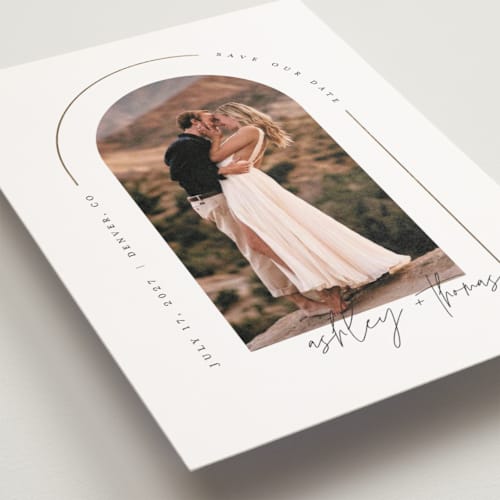 This is a silk save the date postcards with foil pressed by Kelly Schmidt called arch printing on signature in postcard