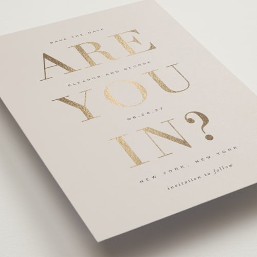 This is a taupe save the date postcards with foil pressed by Sara Hicks Malone called are you in? printing on signature in postcard