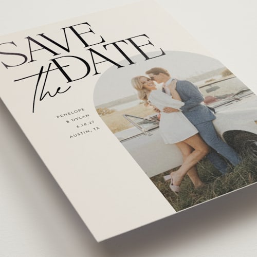 This is a ecru save the date postcards with foil pressed by Morgan Kendall called penelope printing on signature in postcard