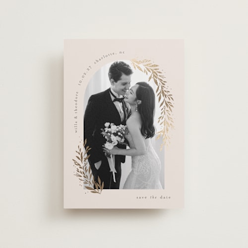 This is a linen petite save the dates with foil pressed by Laura Hankins called garland arch printing on recycled smooth signature in petite