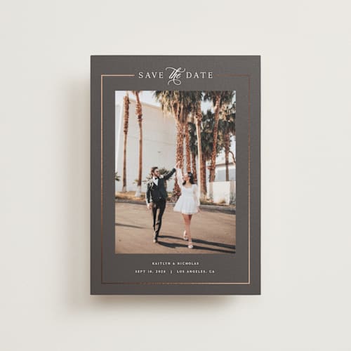 This is a graphite petite save the dates with foil pressed by Melanie Kosuge called mulholland printing on recycled smooth signature in petite