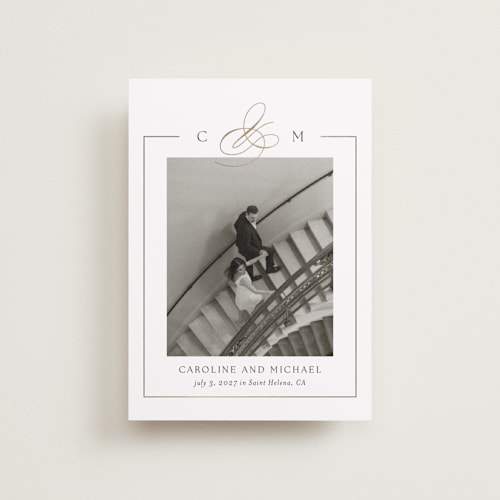 This is a silk petite save the dates with foil pressed by Kelly Schmidt called framed monogram printing on recycled smooth signature in petite