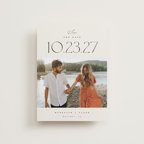 This is a ivory petite save the dates with standard by Carolyn Nicks called romancing the date printing on recycled smooth signature in petite