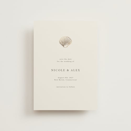 This is a sand petite save the dates with foil pressed by Hannah Bowman called simple seashell printing on signature in petite