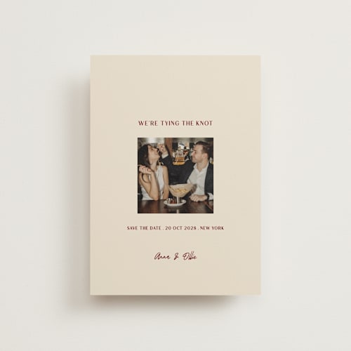 This is a burgundy save the date postcards with standard by Ani Somi called center cut printing on signature in postcard