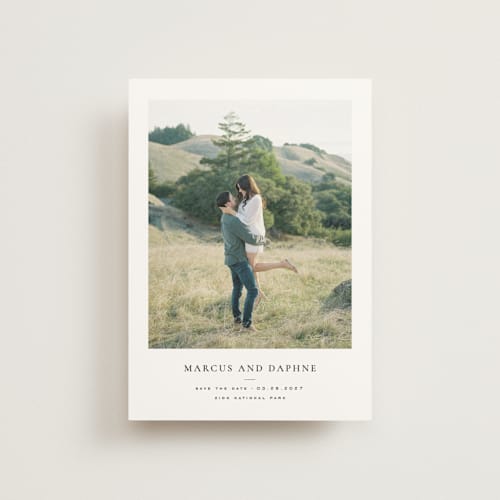 This is a ink save the date postcards with standard by Wildfield Paper Co called daisies printing on signature in postcard