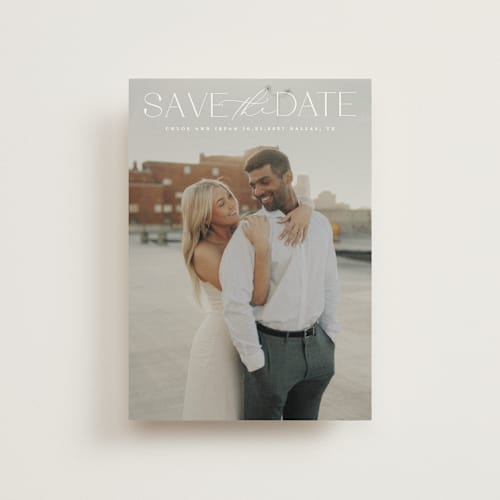This is a ivory save the date postcards with standard by Maja Cunningham called prose printing on signature in postcard