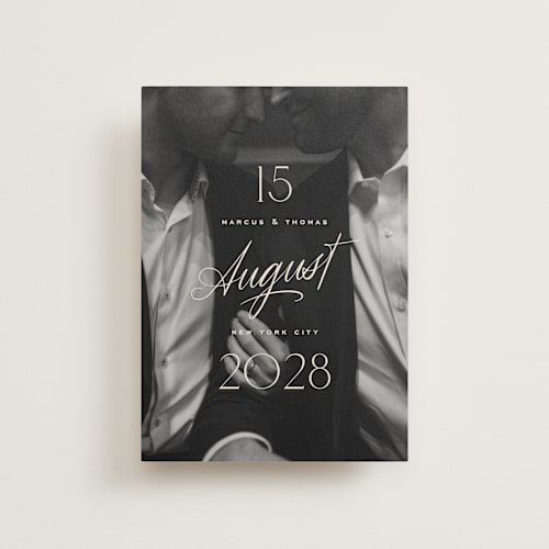 This is a ivory save the date postcards with standard by Oscar and Emma - Karly Depew called the date is set printing on signature in postcard