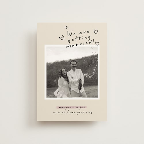 This is a nero save the date postcards with standard by Pati Cascino called surprise! printing on signature in postcard